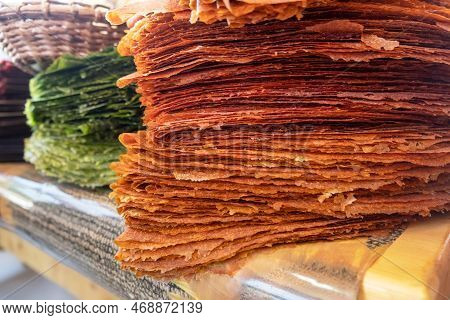 Pile Of Tklapi - Traditional Georgian Pastila Or Fruit Leather. Colorful Dried Mushed Fruit Sheets S
