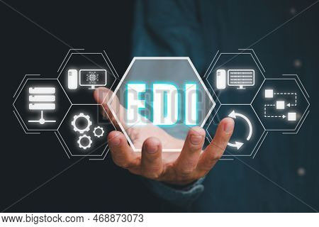 Edi, Electronic Data Interchange Concept, Person Hand Holding Electronic Data Interchange Icon On Vi