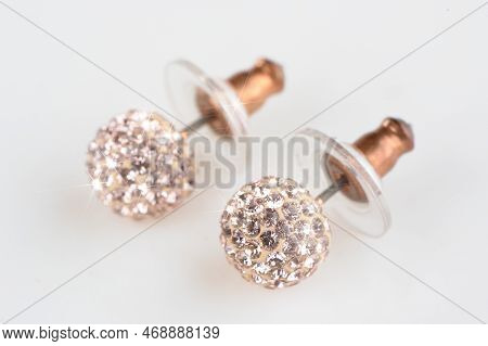 Beautiful Sparkling Stud Earrings On White Background