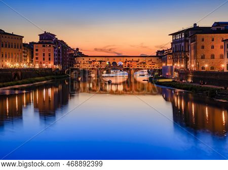Famous Ponte Vecchio Bridge On The River Arno River At Sunset, Florence, Italy