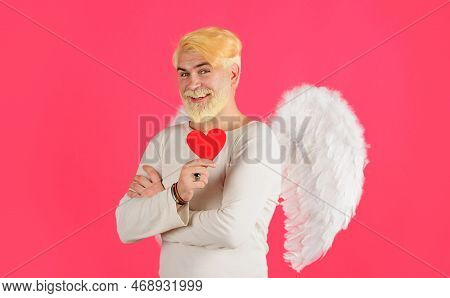 Valentines Day. Happy Angel With White Wings Holding Red Paper Heart. Valentine Card. Copy Space.