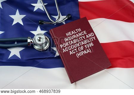 Law Concept. On The Us Flag Lies A Stethoscope And A Book With The Inscription - Health Insurance Po