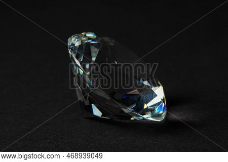 Beautiful Dazzling Diamond On Dark Background, Closeup. Precious Gemstone