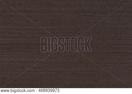 Texture Of Wenge Wood. Dark Brown Wood For Furniture Or Flooring. Close-up Of A Wenge Wooden Plank, 