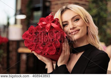 Cute Girlfriend Posing With Valentines Day Red Roses Bouquet, Receiving Romantic Gift From Boyfriend