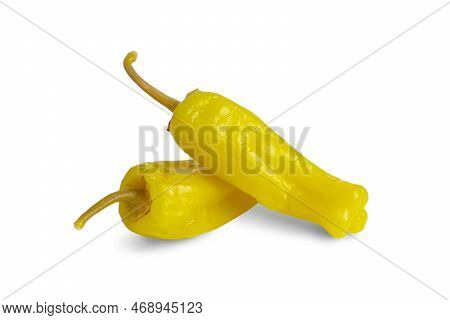Two Pickled Yellow Peppers, Pepperoncini Or Friggitelli Isolated On White Background. Hot Pepper Mar