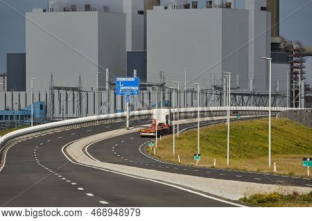 Industrial Facilities, Power Pland And Road In The Port Area Of Rotterdam
