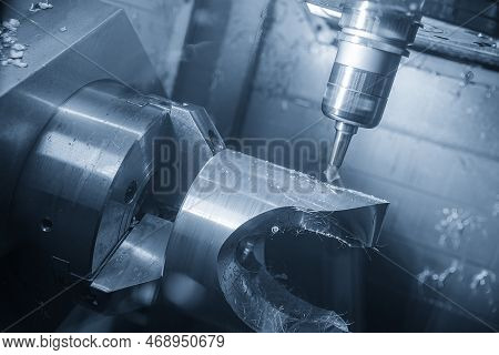 The 5-axis Machining Center Cutting The Automotive Parts By Special Tool. The Hi-precision Automotiv