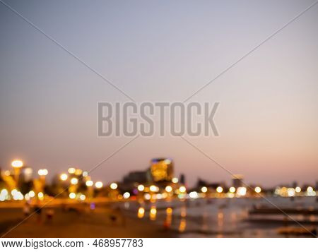 Bokeh Of Blur Night Light City Background,abstract View Skyline Travel Ciryscape Illuminated, Golden