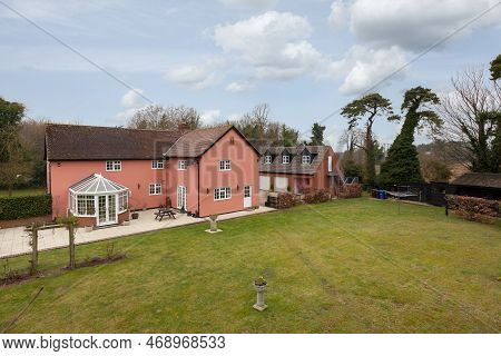 Kennett, Suffolk, England - March 1 2019: Detached House And Gardens With Garage And Annex With Suff