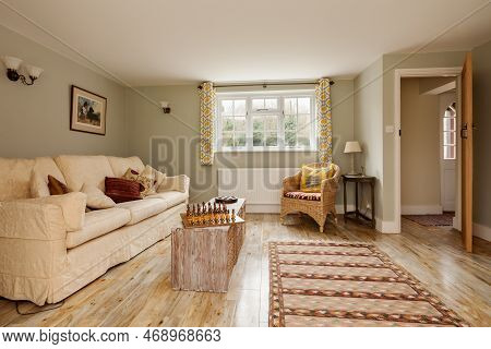 Kennett, Suffolk, England - March 1 2019: Furnished Luxury Living Room With Coffee Table And Chess B