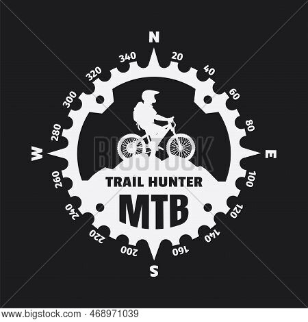 Mountain Biker, Logo In The Form Of A Compass On A Dark Background. Vector Illustration.