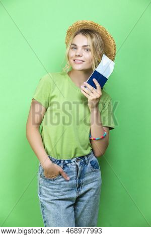 Travel Ideas. Dreaming Winsome Llovely Smiling Young Girl In Straw Hat Holding Passport With Tickets