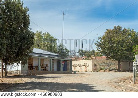 Van Wyksdorp, South Africa - Sep 24, 2022: A Street Scene, With A Business, In Van Wyksdorp In The W