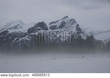 Mount Schluchhore On A Misty Winter Morning.