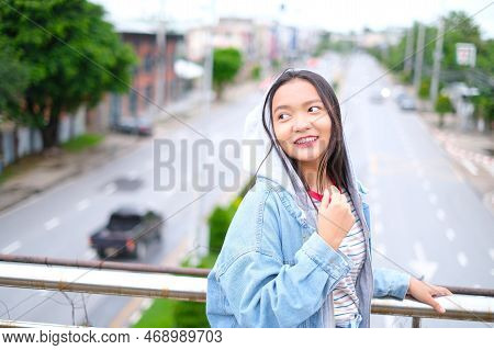 Portrait Happy Young Girl With Beautiful Landscape View At Roiet Thailand.