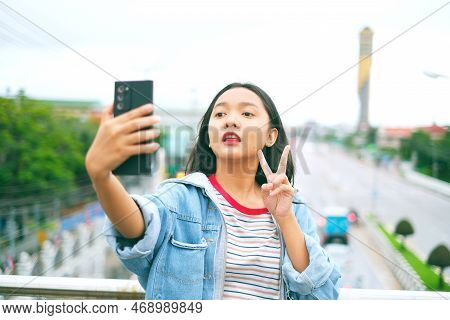 Happy Young Girl Use Mobile Selfi Photo With Landscape View.