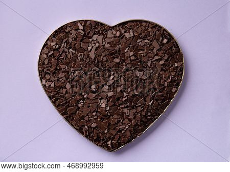 Heart Shaped Chocolate On Neutral Background Top View With Place For Text. Chocolate Chips In A Box 