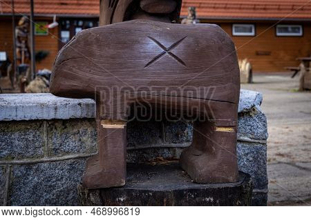 Sobotka, Poland - December 31, 2022:  Wooden Copy Of A Famous Ancient Sculpture Of The Slezan Bear. 