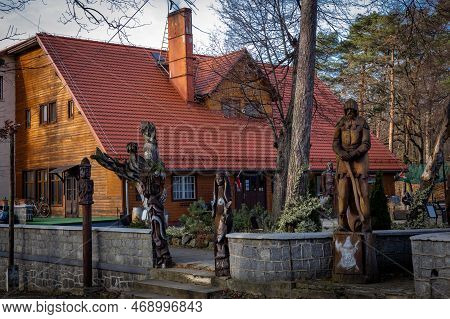 Sobotka, Poland - December 31, 2022: Tourist House And Restaurant Pod Wiezyca. Wooden House With Fol