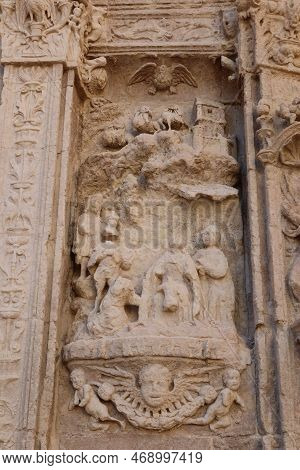 Biar, Alicante, Spain, January 14, 2023: Detail Of The Stone Reliefs On The Main Entrance Door Of Th