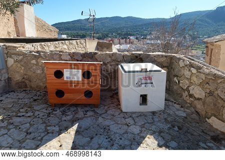 Biar, Alicante, Spain, January 14, 2023: Feeding Point Next To The Castle Of The Controlled Feline C