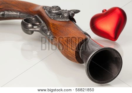 Old Gun And Red Heart