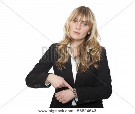 Young Businesswoman Pointing To Her Watch