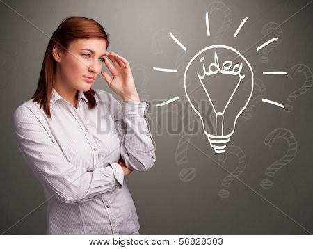 Pretty young girl comming up with a light bubl idea sign
