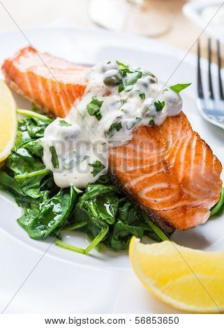 Grilled Salmon with Spinach, Tartare Cream and Lemon Wedges