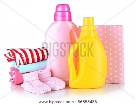 Softener dryers and washing powder with children clothes isolated on white