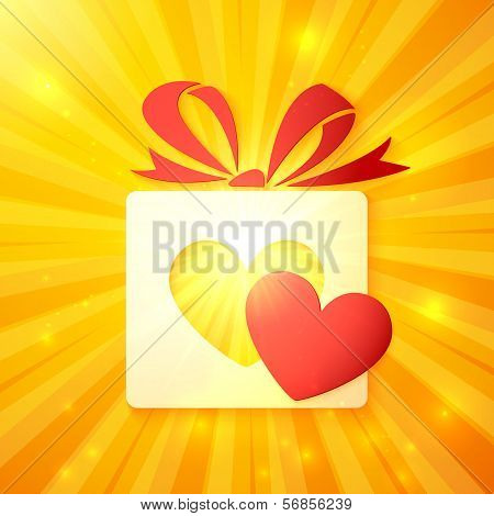 Paper gift box with cutout red heart