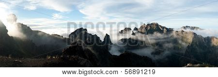 panoramic view of Pico Ruivo and Pico do Areeiro peaks in Madeira, Portugal 