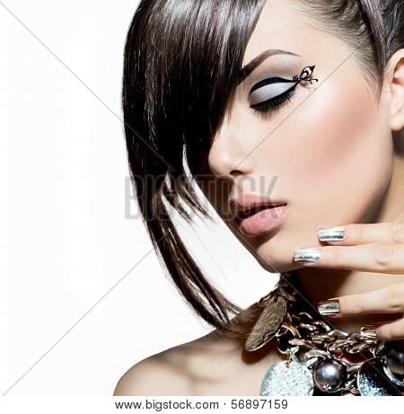 Fashion Model Girl Portrait. Trendy Hair Style. Short Haircut. Hairstyle. Beauty Woman closeup. Fringe. Hairdressing. Silver Metallic Accessories and Manicure. Beauty Woman close up. Perfect Skin 