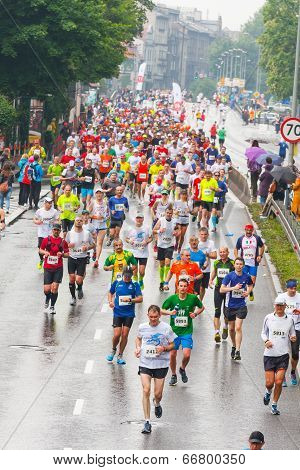 Krakow, Poland - May 18 : Cracovia Marathon. Runners On The City Streets On May 18, 2014 In Krakow,