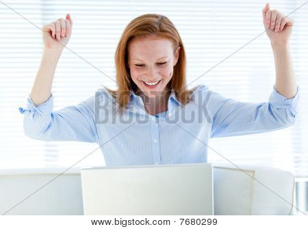 Radiant Business Woman Punching The Air