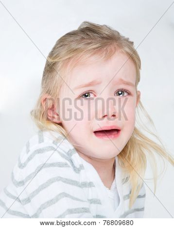 Closeup Of Very Sad Young Girl