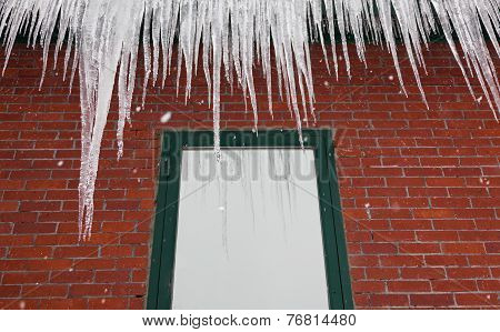 Icicles On A Red Brick Building