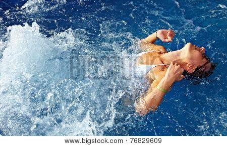 Beautiful girl relaxing in . Spa background