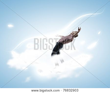 Young guy in casual evading from light rays