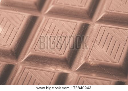 Chocolate bar close up, milk choc. Macro photo.