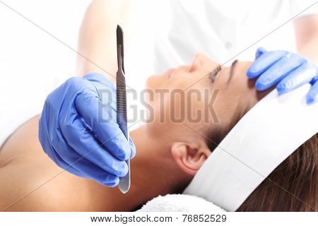 Plastic surgery, a woman in the clinic of aesthetic surgery