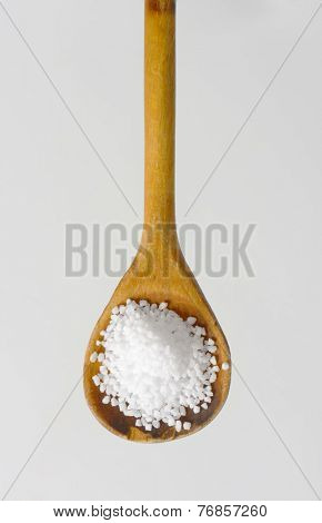wooden spoon with coarse salt