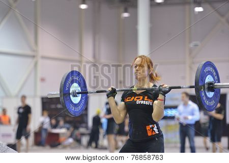 NOVOSIBIRSK, RUSSIA - NOVEMBER 16, 2014: Unidentified female athlete during the International crossfit competition Siberian Showdown. The competition is part of the festival Siberian Health.