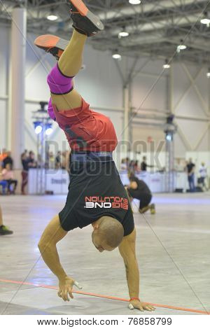 NOVOSIBIRSK, RUSSIA - NOVEMBER 16, 2014: Unidentified athlete during the International crossfit competition Siberian Showdown. The competition included in the program of the festival Siberian Health.