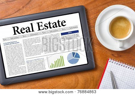 Tablet on a desk - Real Estate