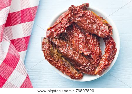 top view of sun dried tomatoes in plate