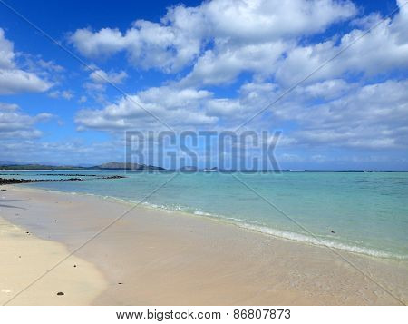 Beach Next To Pahonu Pond (ancient Hawaiian Fishpond) With Shallow Wavy Ocean Waters Of Waimanalo Ba