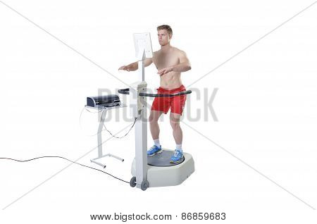 Sportsman Doing Balance Assessment With Professional Equipment. Modern Technology.