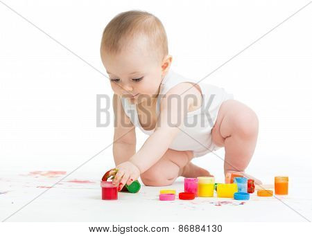 baby painting by hands